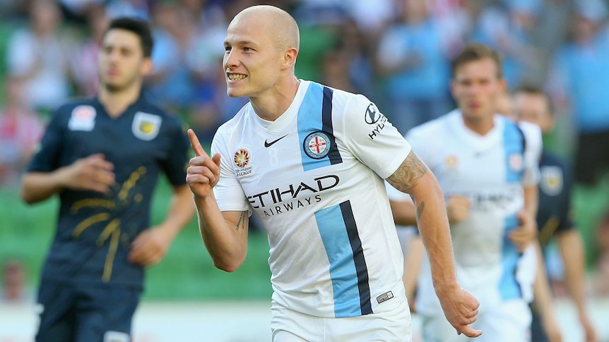 Aaron Mooy celebrates a goal for Melbourne City against Central Coast Mariners at AAMI Park.