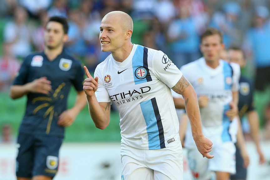 Aaron Mooy celebrates a goal for Melbourne City against Central Coast Mariners at AAMI Park.
