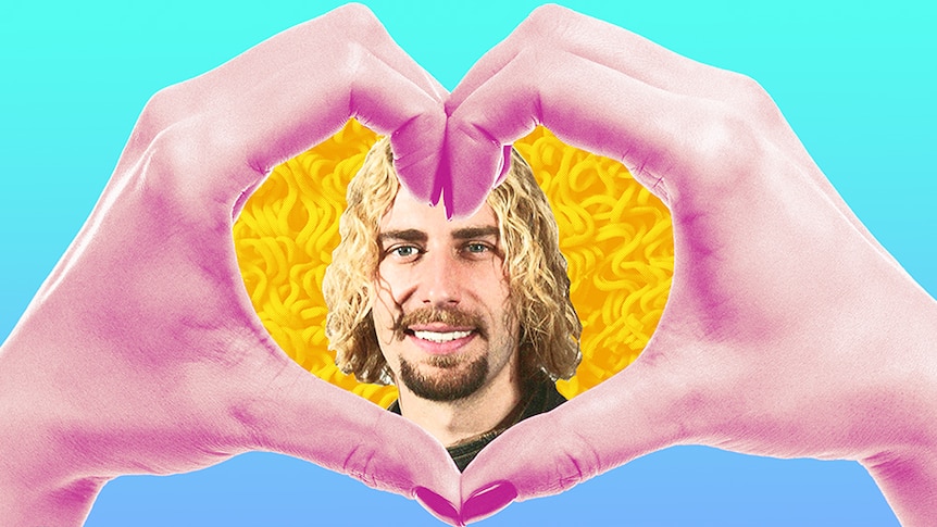 Hands form a heart around an image of Nickelback's Chad Kroeger