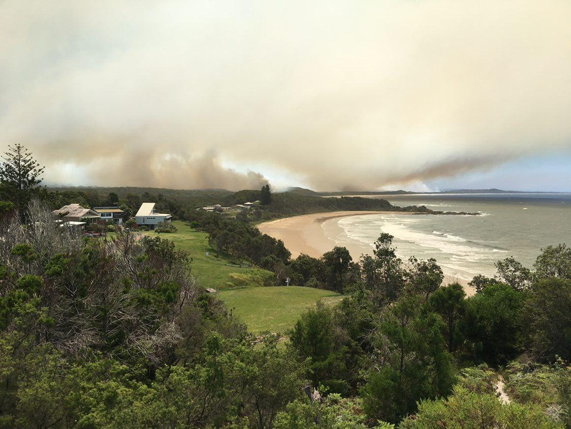 Aircraft called in to fight bushfire burning close to Wooli, Minnie