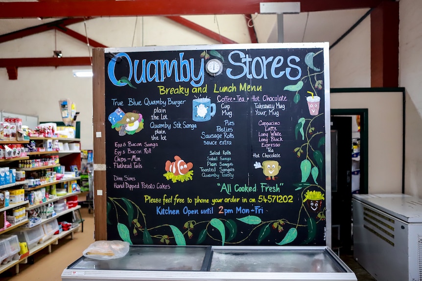 A shop sign with handwritten meal offers