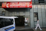 An ambulance at the CHU de Rennes Hospital in France where six people are in a serious condition after a drug trial