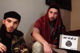 Screenshot of two men appearing in a video said to be pledging allegiance to Islamic State.