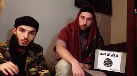 Screenshot of two men appearing in a video said to be pledging allegiance to Islamic State.