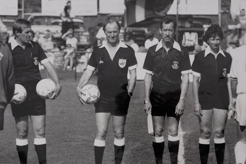 Black and white photo of Marilyn Learmont and other referees 