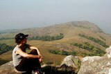 Sitting on a mountaintop on Mt Bintumani in Sierra Leone is Ali Readhead