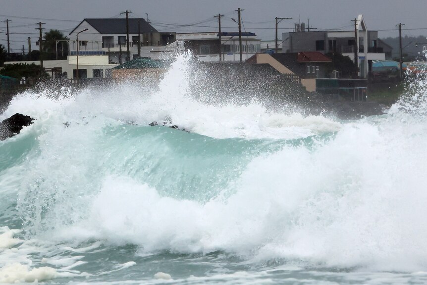 High waves crash a shore as the tropical storm named Khanun approaches to the Korean Peninsular.