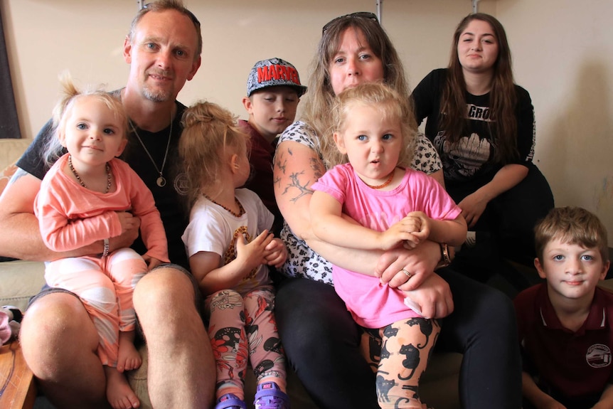 Simon and Louise Adams with their children.