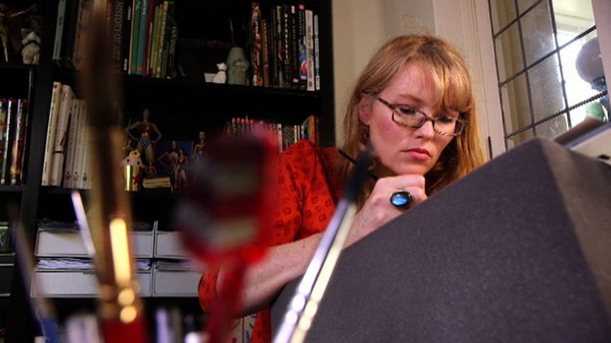 Australian comic book artist Nicola Scott at work in her Potts Point home studio.