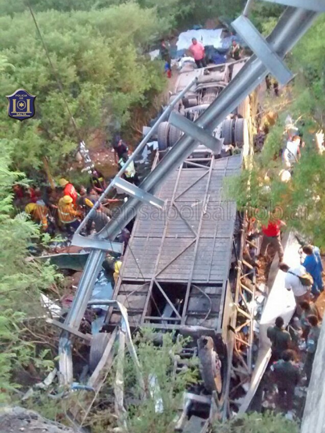 Police bus crashes off bridge in Argentina