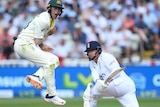 Marnus Labuschagne jumps up close to the pitch as Jonny Bairstow completes a sweep shot