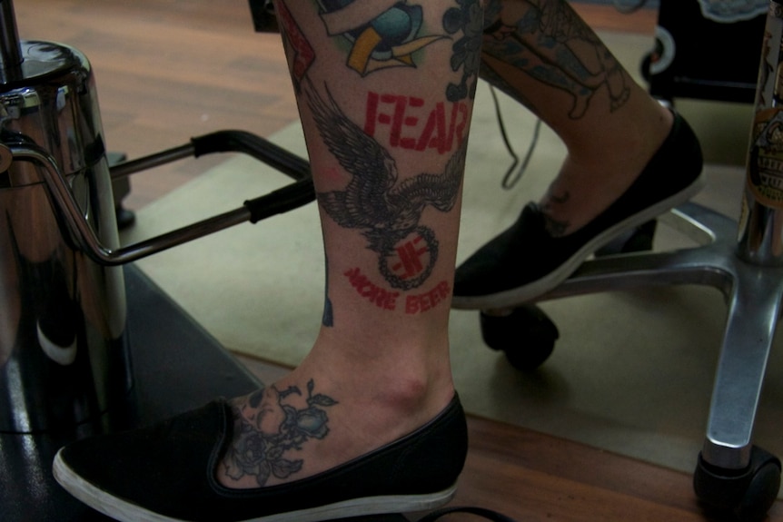 A tattooed leg.