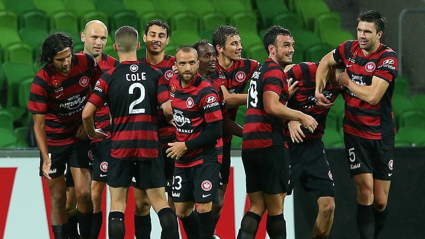 The streak continues ... the Wanderers celebrate Labinot Haliti's first goal.