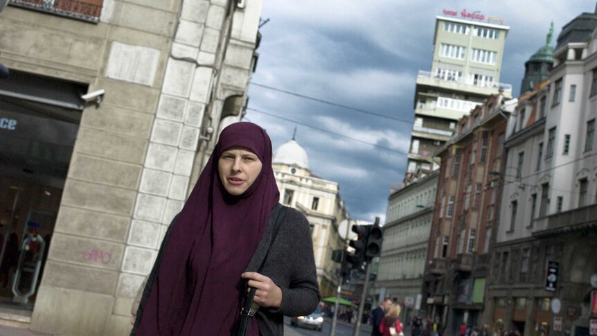 A Muslim woman on the upmarket Marshal Tito Street in the Bosnian capital, Sarajevo.