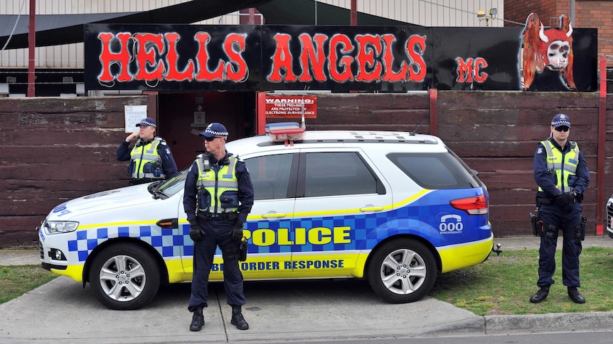 Police stand guard outside the Hells Angels clubhouse in Thomastown.