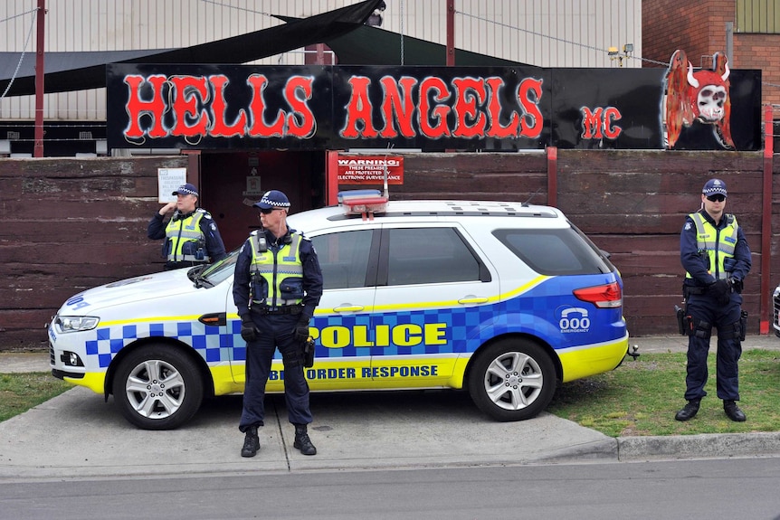 Police stand guard outside the Hells Angels clubhouse in Thomastown.