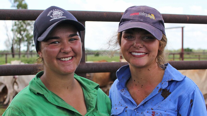 Two women  working in NT cattle stations.