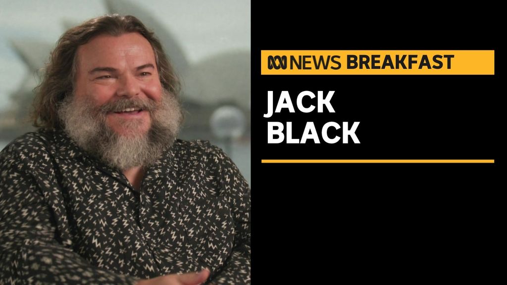 Jack Black: Jack Black conducts a television interview.