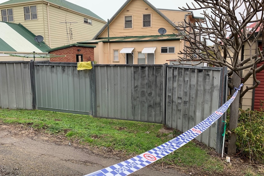 Police tape outside a house