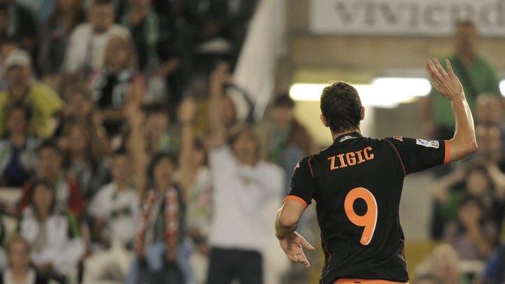 Relief in victory...Zigic's goal helped Valencia to its first win from four starts.