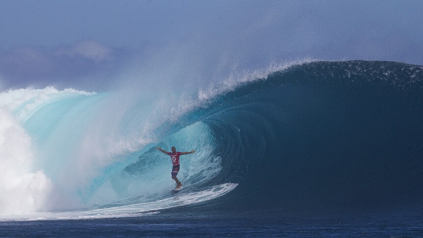 Kelly Slater scoring an epic Fijian barrel