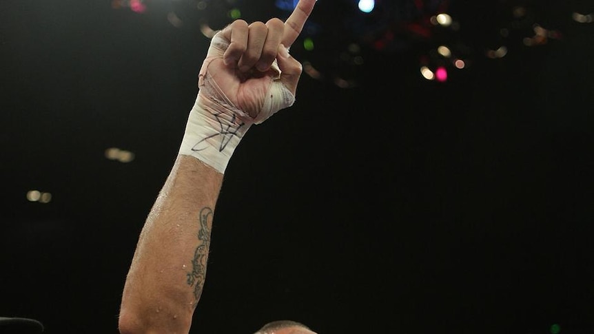 I'm number one: Anthony Mundine keeps his career alive with a gutsy victory.