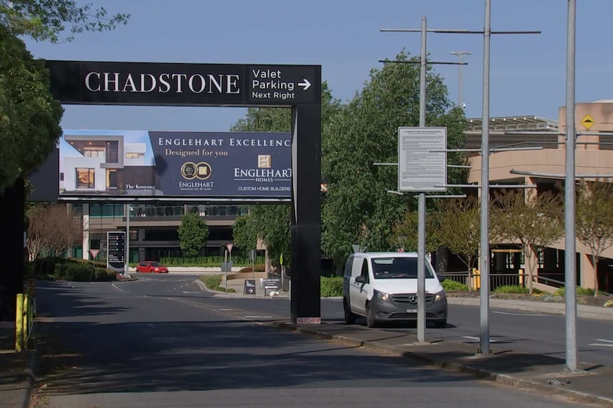 A large sign above a road says 'CHADSTONE'.