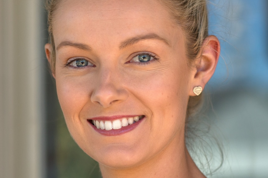 Woman smiles at camera