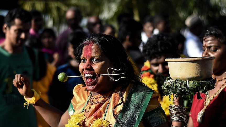 Hindu devotee in a trance during Thaipusam in Malaysia