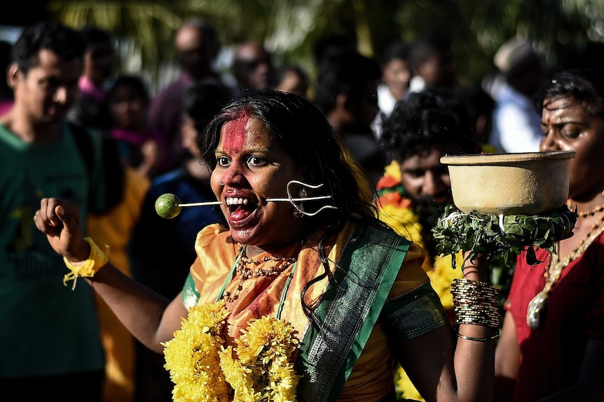 Hindu devotee in a trance during Thaipusam in Malaysia