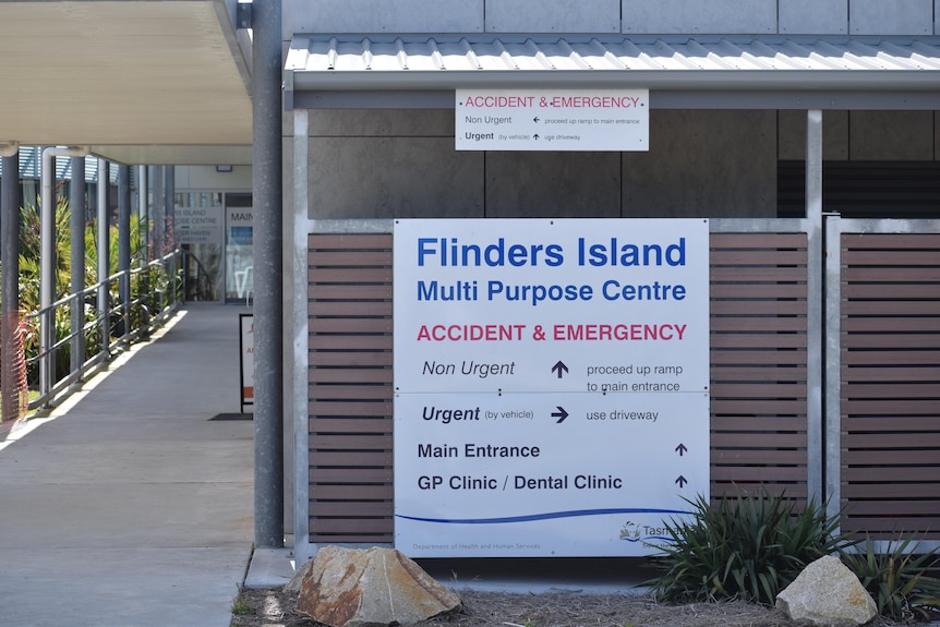 Building entrance with sign reading "Flinders Island Multi Purpose Centre".