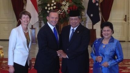 Tony Abbott and SBY shake hands