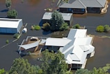 Flood waters fill the town of Nathalia, but residents staying put.