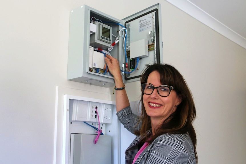 Brooke Walters from Economic Development Queensland with a new airconditioning technology.