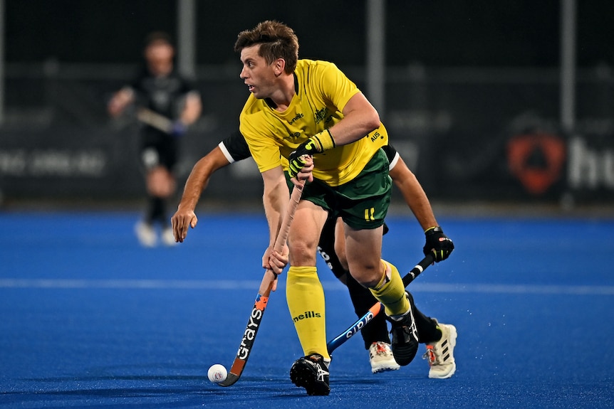 Eddie Ockenden in action playing hockey