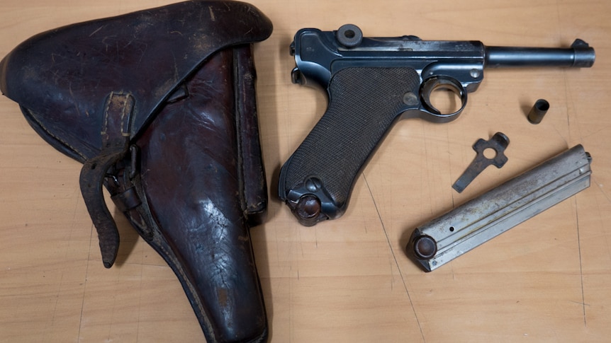 A 1915 WWI German Luger pistol  and holster surrendered in the firearms amnesty.