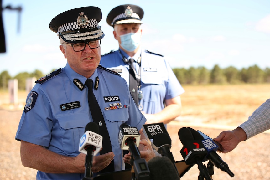 A mid-shot of WA Police Commissioner Chris Dawson speaking in uniform at a media conference outdoors.