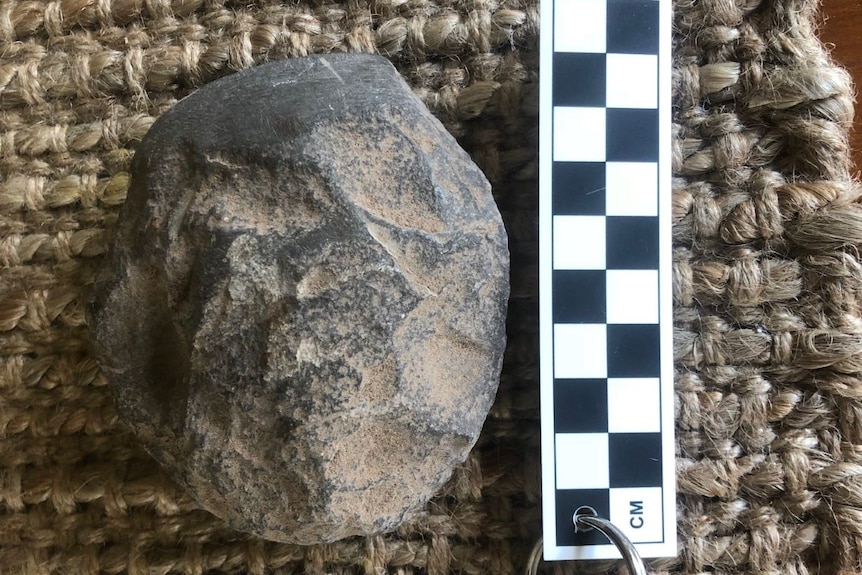 Photo of a stone which has been shaped.