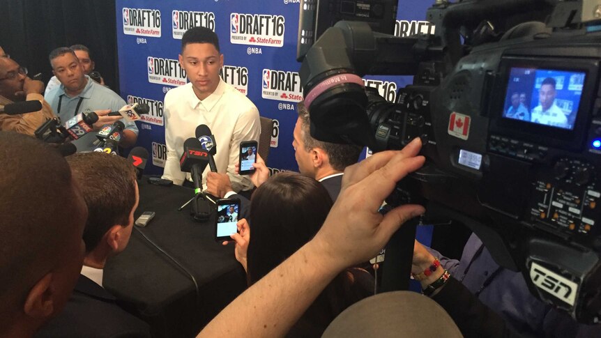 Ben Simmons is interviewed by media.