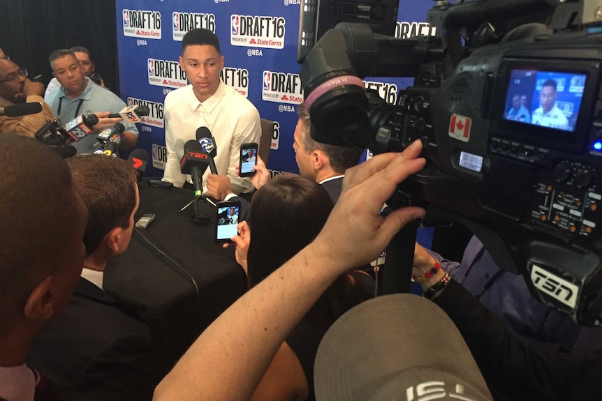 Ben Simmons is interviewed by media.