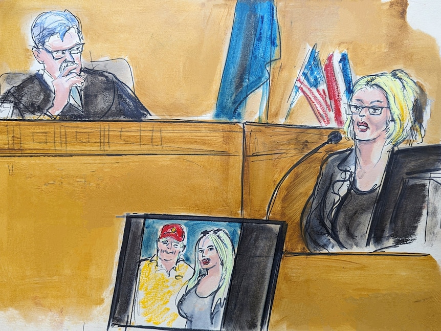 A crayon sketch depicting a woman in a suit sitting in a court room standing with a judge looking down at her