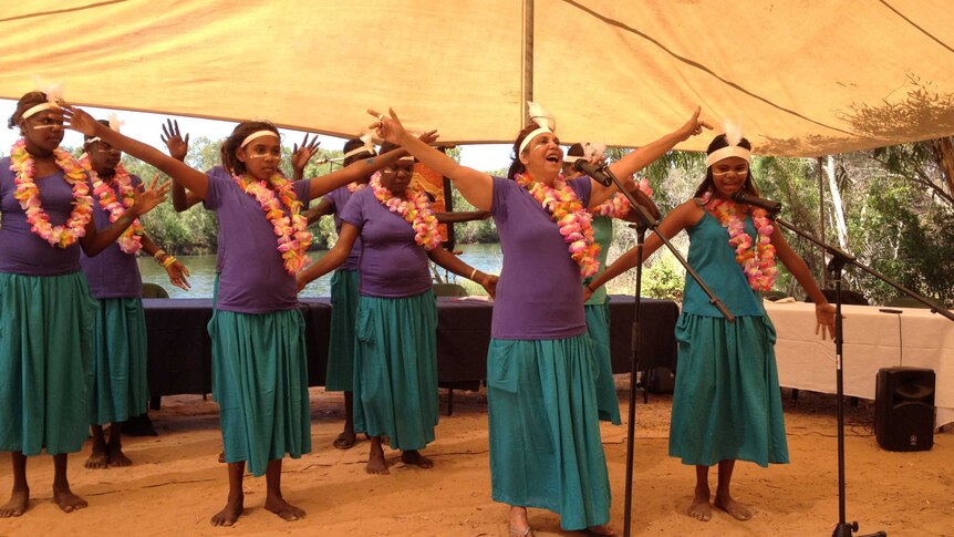 Shellie Morris and the Borroloola song women performing on the bank of the McArthur river in traditional dress