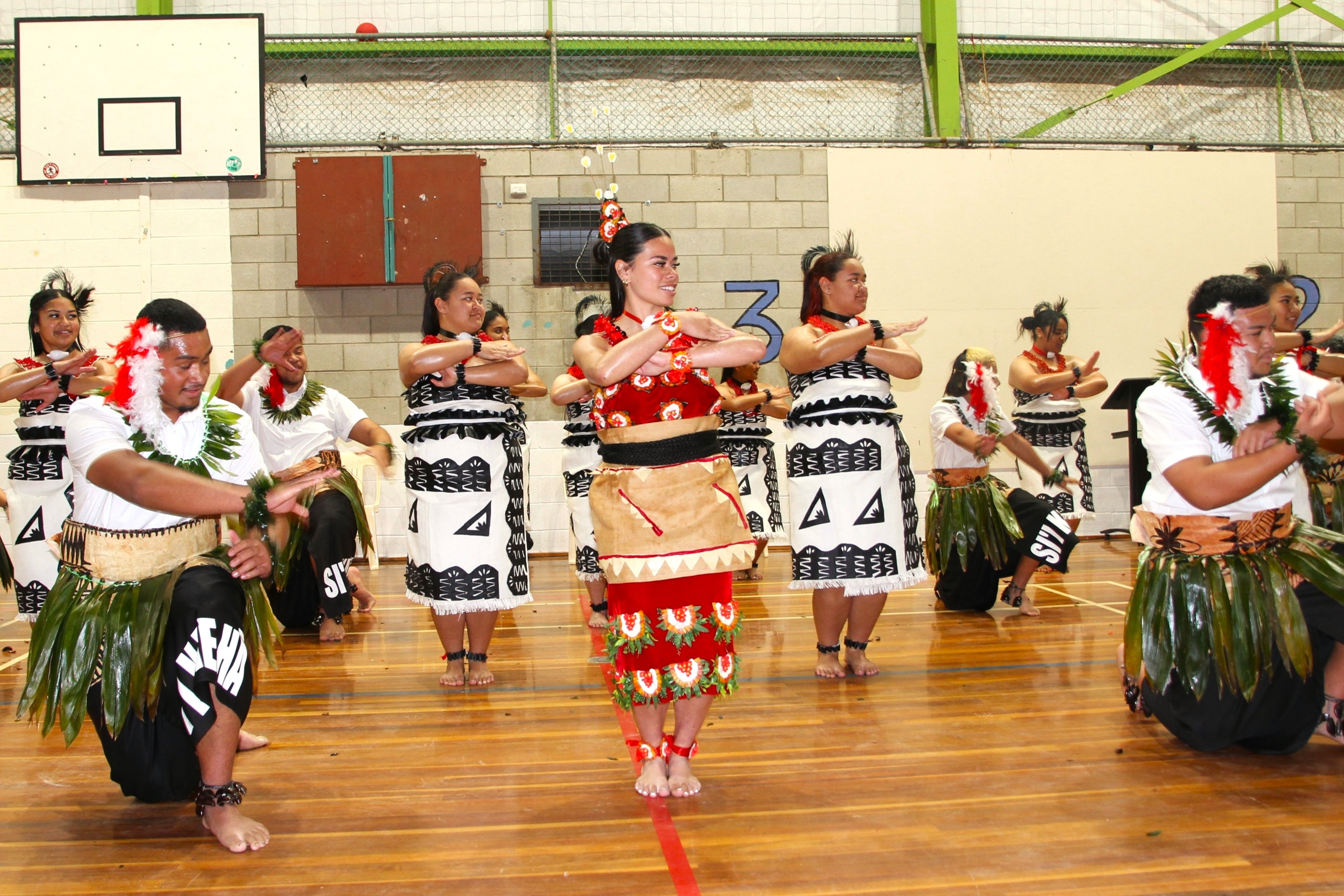 Si'i Kae Hā performing for their 4Cs Showcase set for their school during an assembly.
