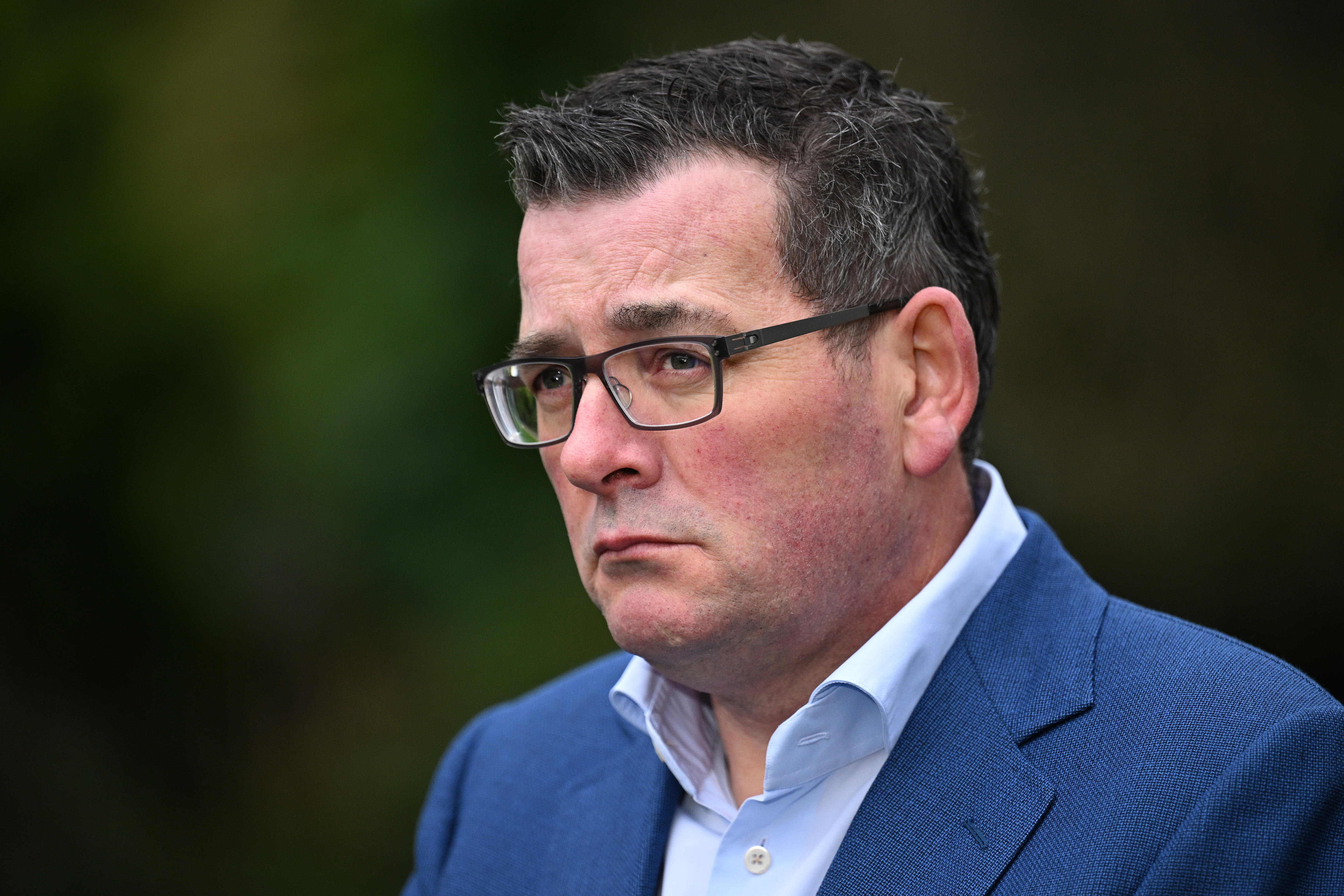 A close-up picture of Victorian Premier Daniel Andrews looking thoughtful.