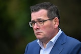 A close-up picture of Victorian Premier Daniel Andrews looking thoughtful.