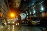 A cement truck delivers its load in the Clem7 tunnel