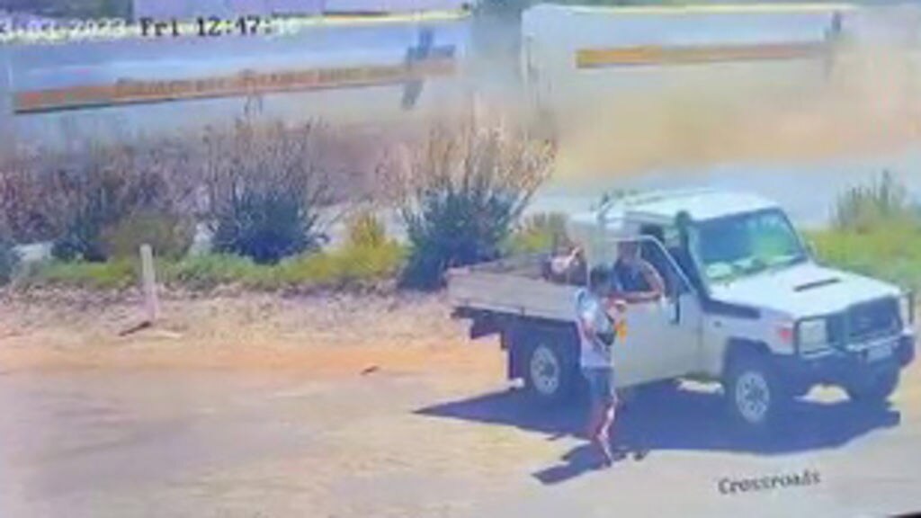 A car parked by the side of the road.