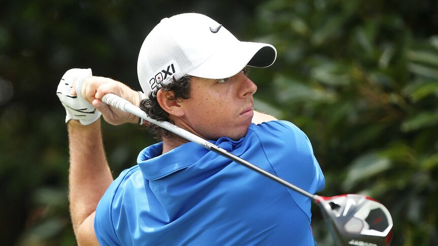 On the prowl ... Rory McIlroy makes his tee shot to open his final round