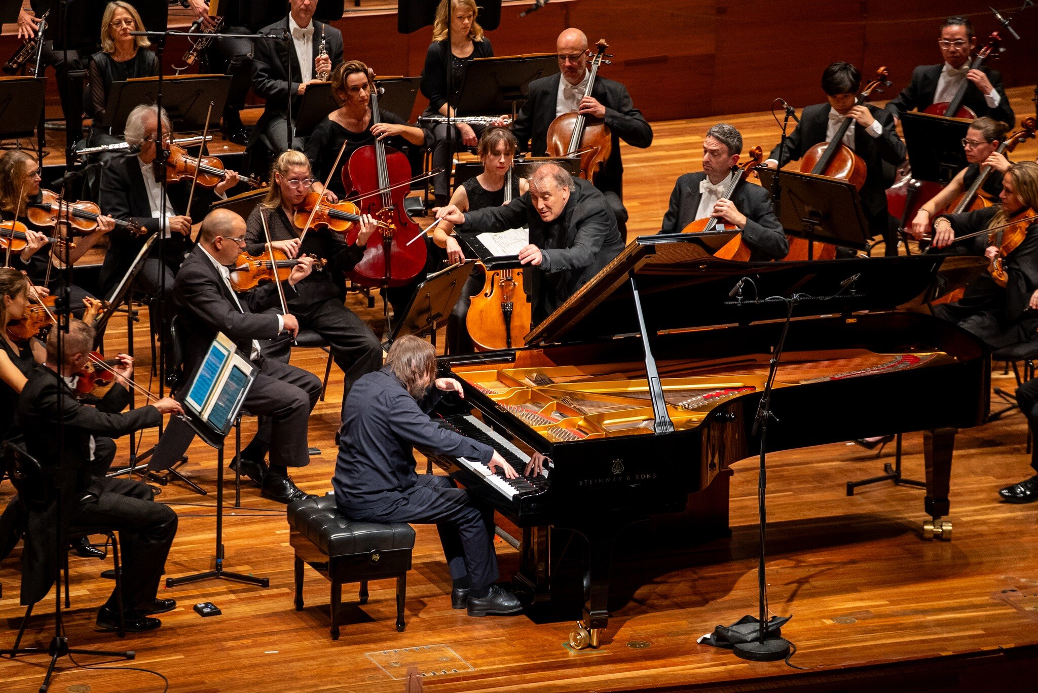 Daniil Trifonov performing on the Hamer Hall stage with the Melbourne Symphony Orchestra.