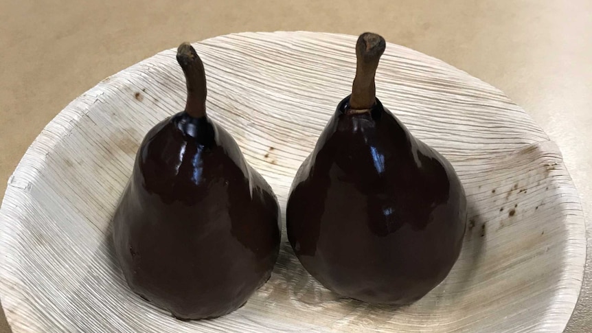 Saffron and white wine poached pear in Glacagé Noir